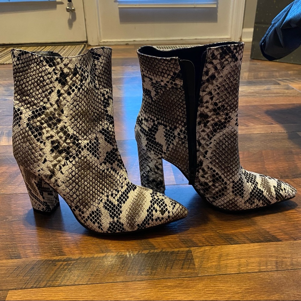Snakeskin side zipper boots